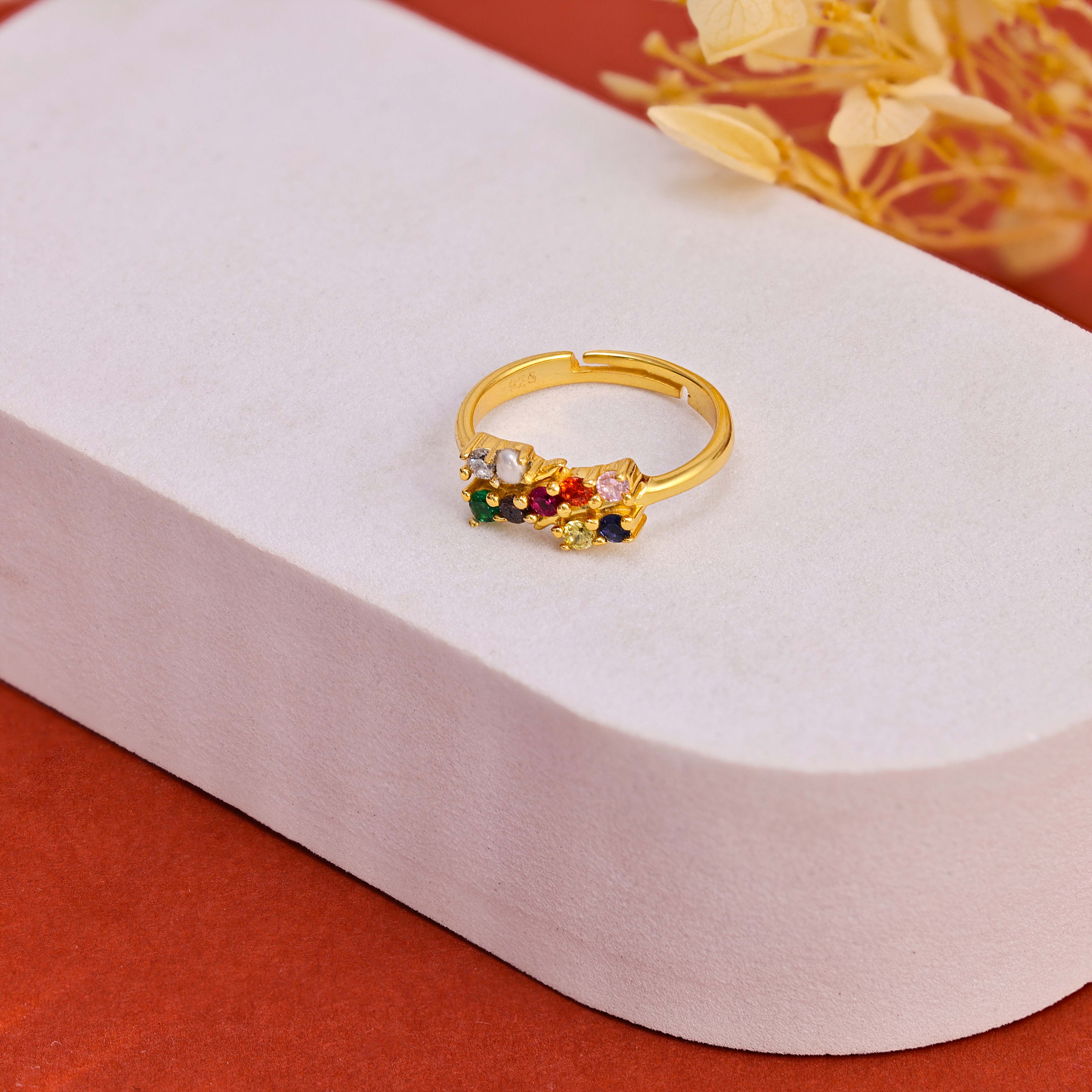 Palish Rong Buy Elegant Gold Polish Navarathna Ring in Sterling Silver | GRT Jewellers