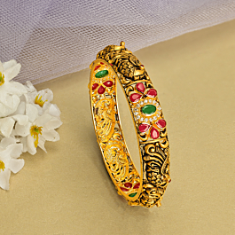Captivating Peacock With Floral Gold Bangle