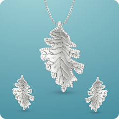 Ornate Leaf Pattern Silver Pendant With Earrings Set